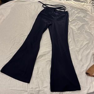 Hip lifting flare pants with waist strap